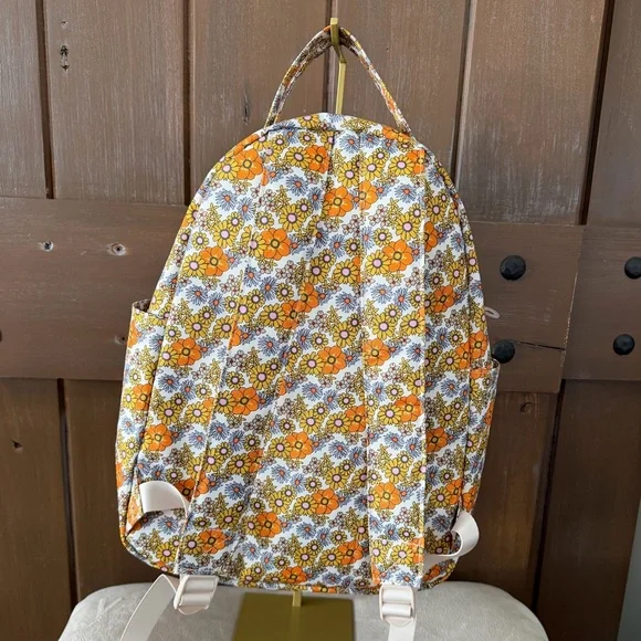 Add some color to your wardrobe with this Floral Orange and Yellow Backpack. - Picture 2 of 10
